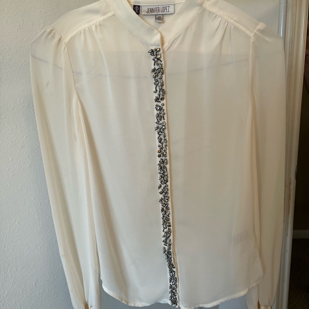 Elegant and unique white blouse